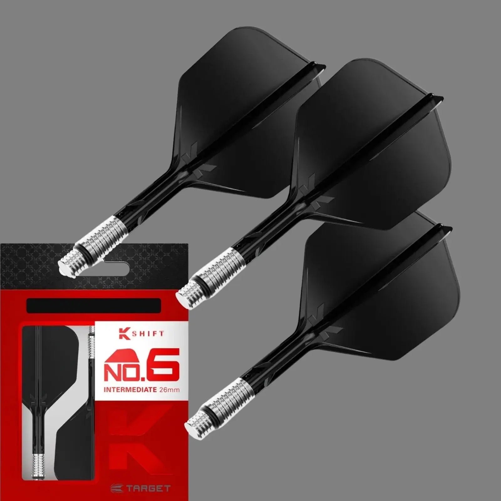 Two black K-SHIFT No.6 Intermediate 20mm dart flights with silver metal tips, shown next to their red and black retail packaging on a solid gray background.